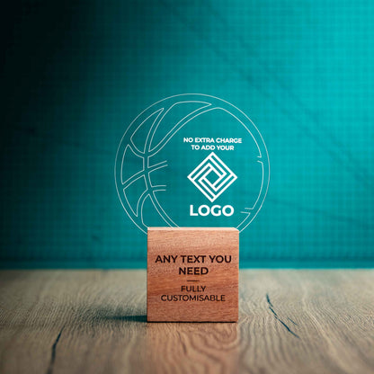 A medium Basketball trophy with custom text and logos, on an eco-friendly wooden base, with a clear Perspex Basketball mounted on top, featuring fully customisable areas for text and logos.