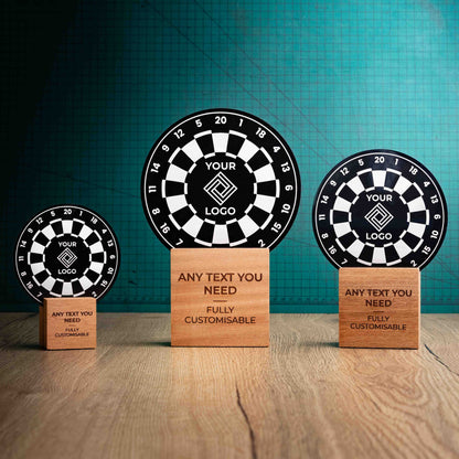 Three darts trophies with custom text and logos, on eco-friendly wooden bases, with a black Perspex darts board mounted on top, featuring fully customisable areas for text and logos.