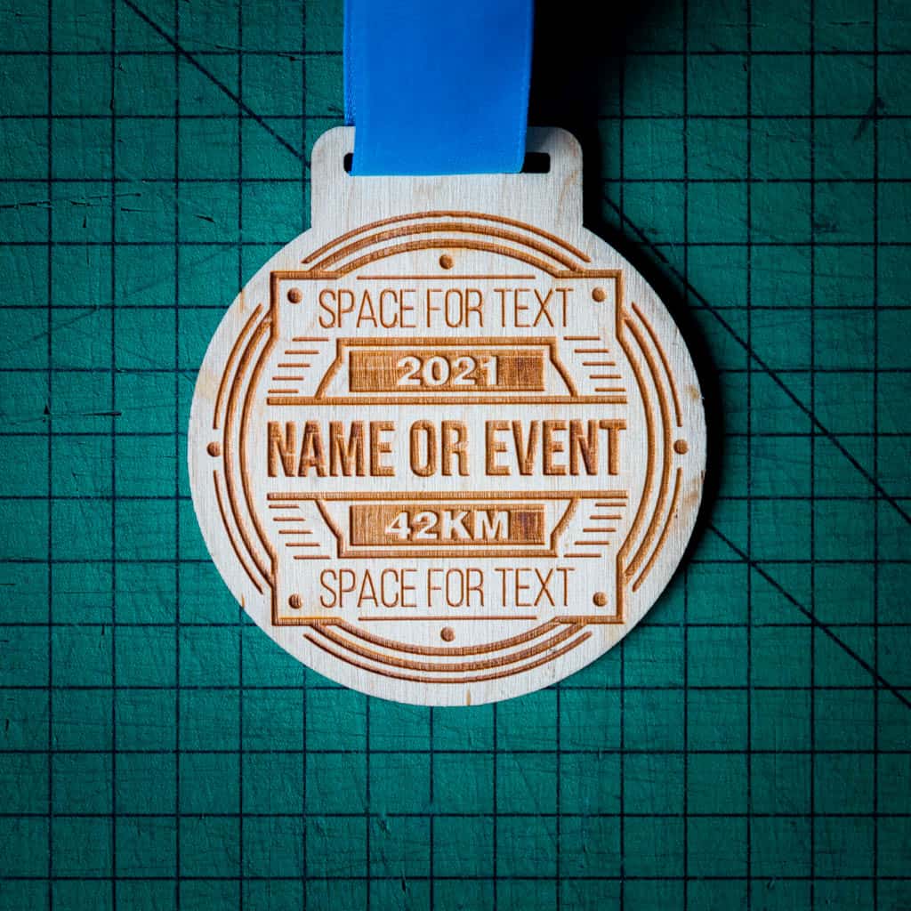 A laser engraved personalised Eco-friendly wooden medal