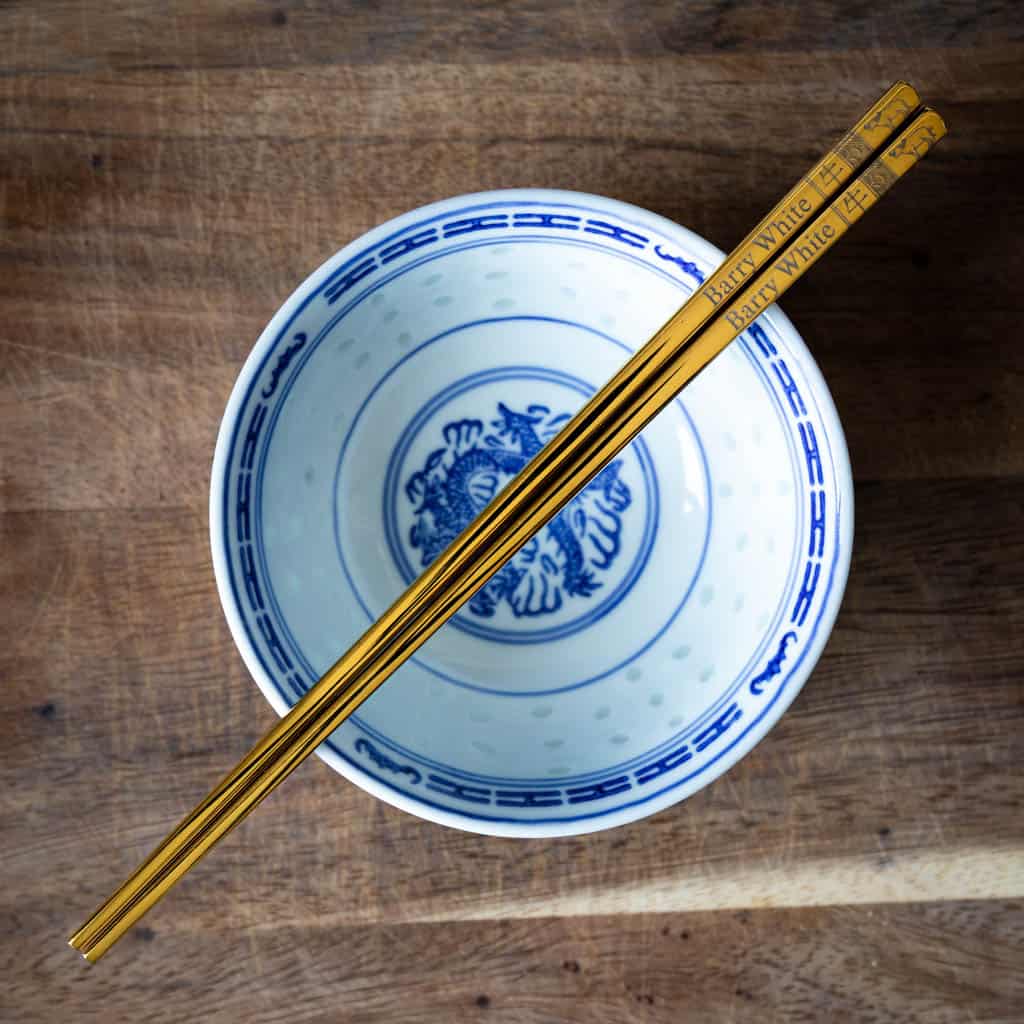 A pair of personalised Gold Chinese Zodiac Chopsticks, Bull, laser engraved with a name of your choice