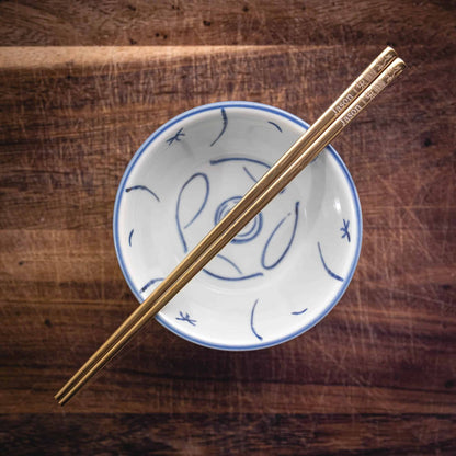 A pair of personalised Gold Chinese Zodiac Chopsticks, Rabbit, laser engraved with a name of your choice