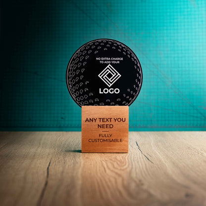 A large golf award trophy with custom text and logos, on an eco-friendly wooden base, with a black Perspex golf ball mounted on top, with fully customisable areas featuring fully customisable areas for text and logos.