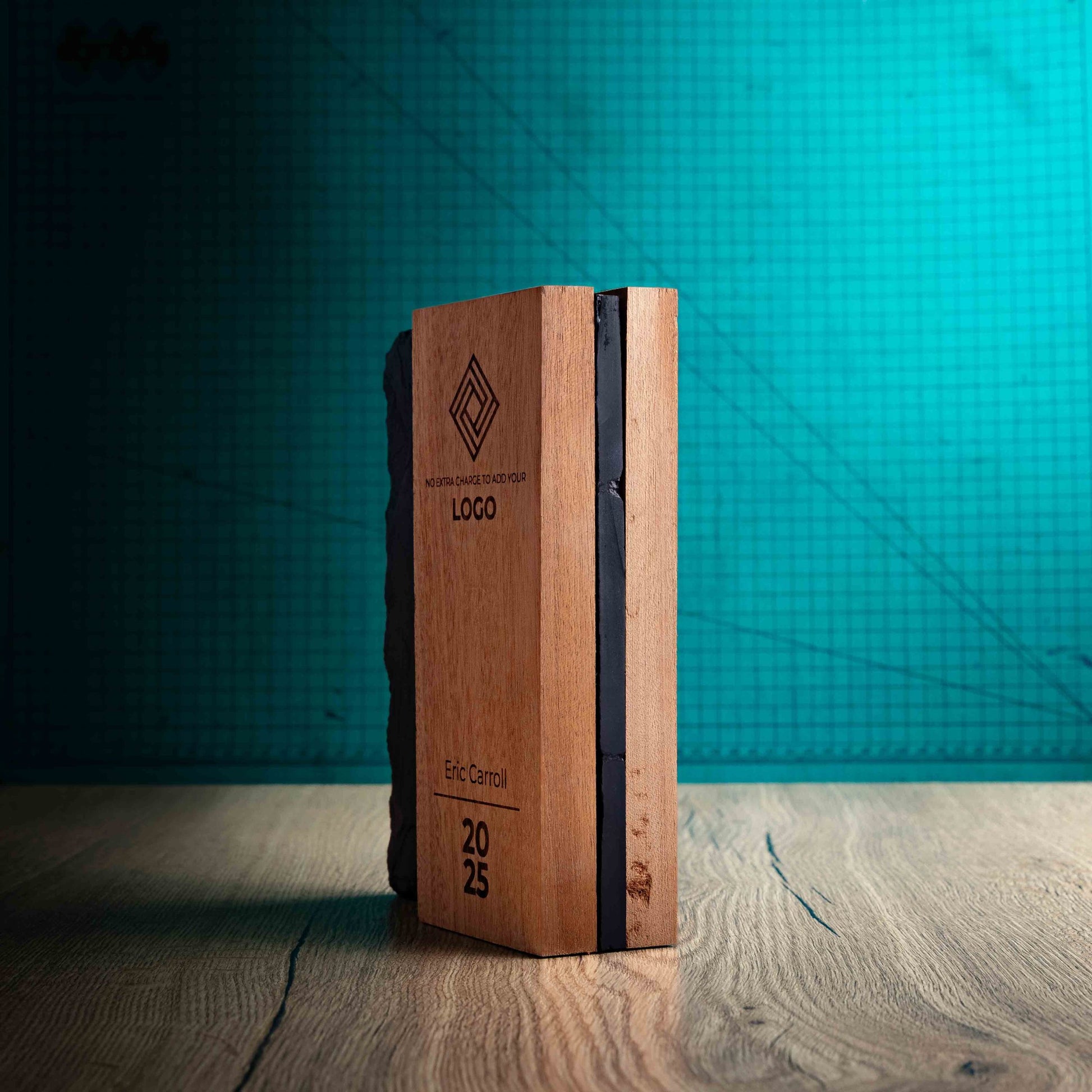 A Large Henge Award, a laser-engraved, eco-friendly wooden and slate trophy, made of two pieces of Sapele wood with a piece of natural Snowdonian slate.