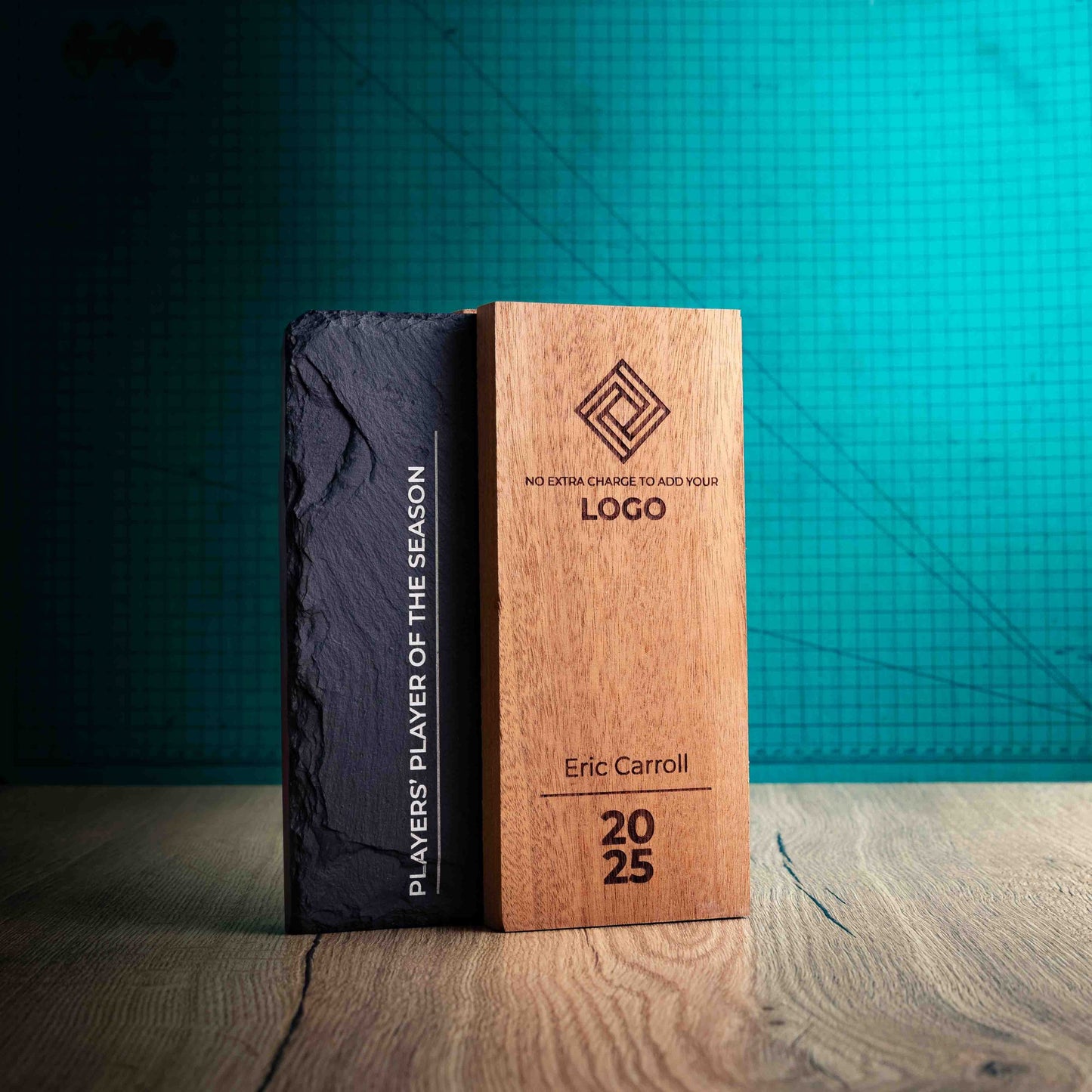 A medium Henge Award, a laser-engraved, eco-friendly wooden and slate trophy, made of two pieces of Sapele wood with a piece of natural Snowdonian slate.