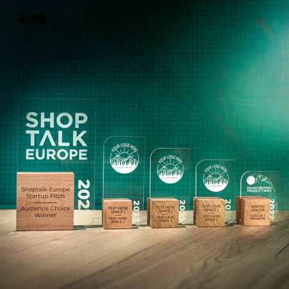 Leaf Trophies, five personalised laser engraved Perspex trophies with an eco friendly wooden base