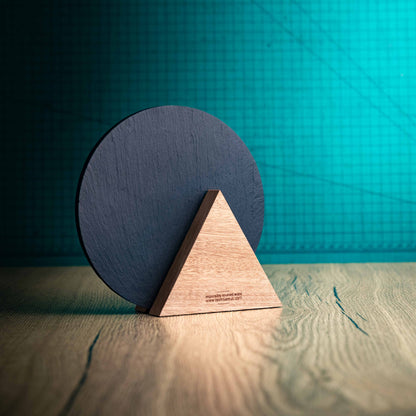 The back of a Medium Luna Award, a laser-engraved, eco-friendly, wooden and slate trophy