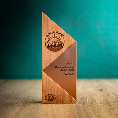 A Large Metallic Peak Trophy. An eco-friendly personalised wooden trophy with a bronze acrylic accent. A Triangular wooden trophy laser-engraved with a logo and trophy personalisation.