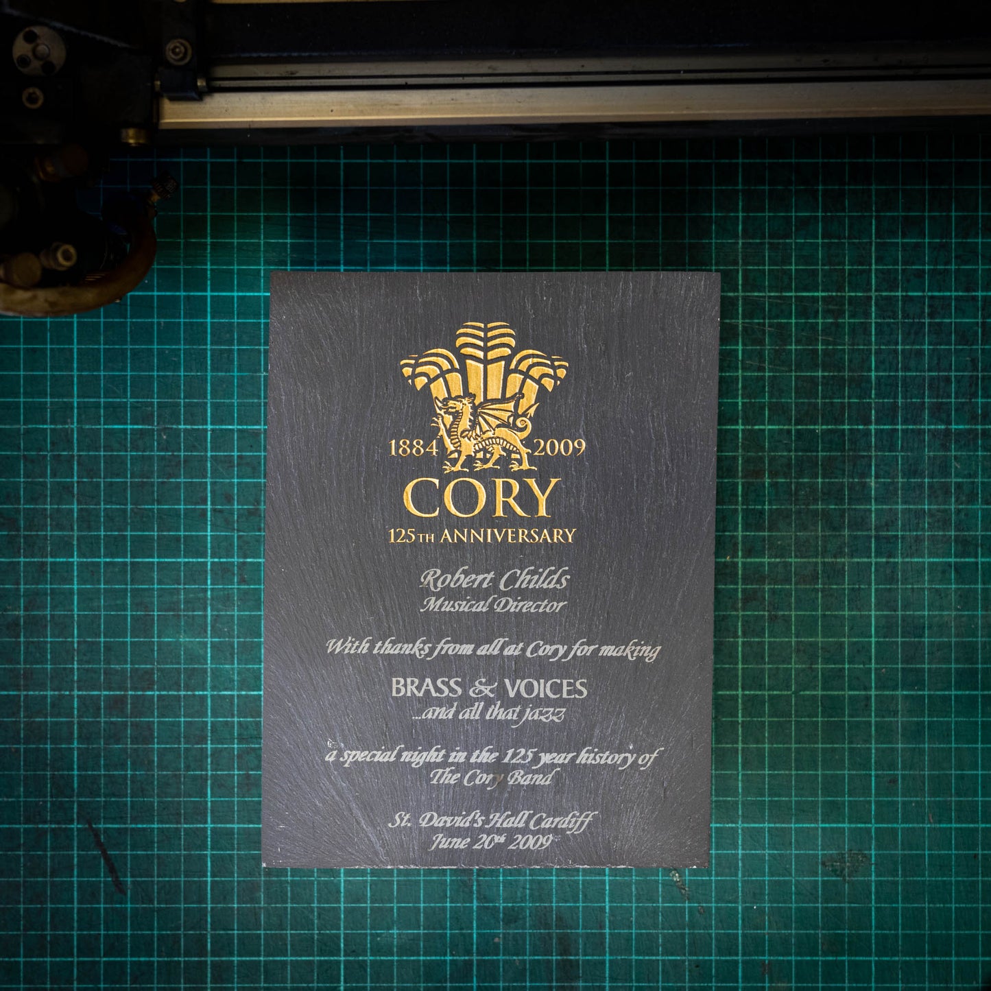 A medium, natural, colour-filled slate trophy