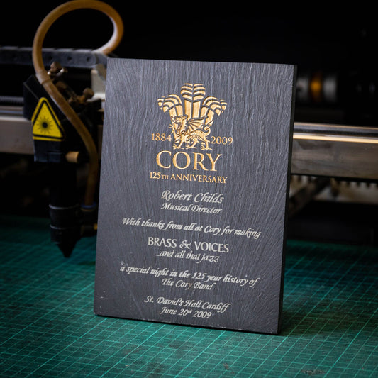 A medium, natural, colour-filled slate trophy