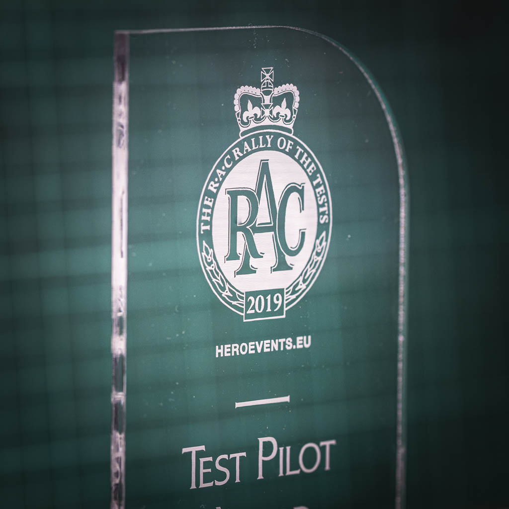 A personalised laser engraving on a perspex trophy