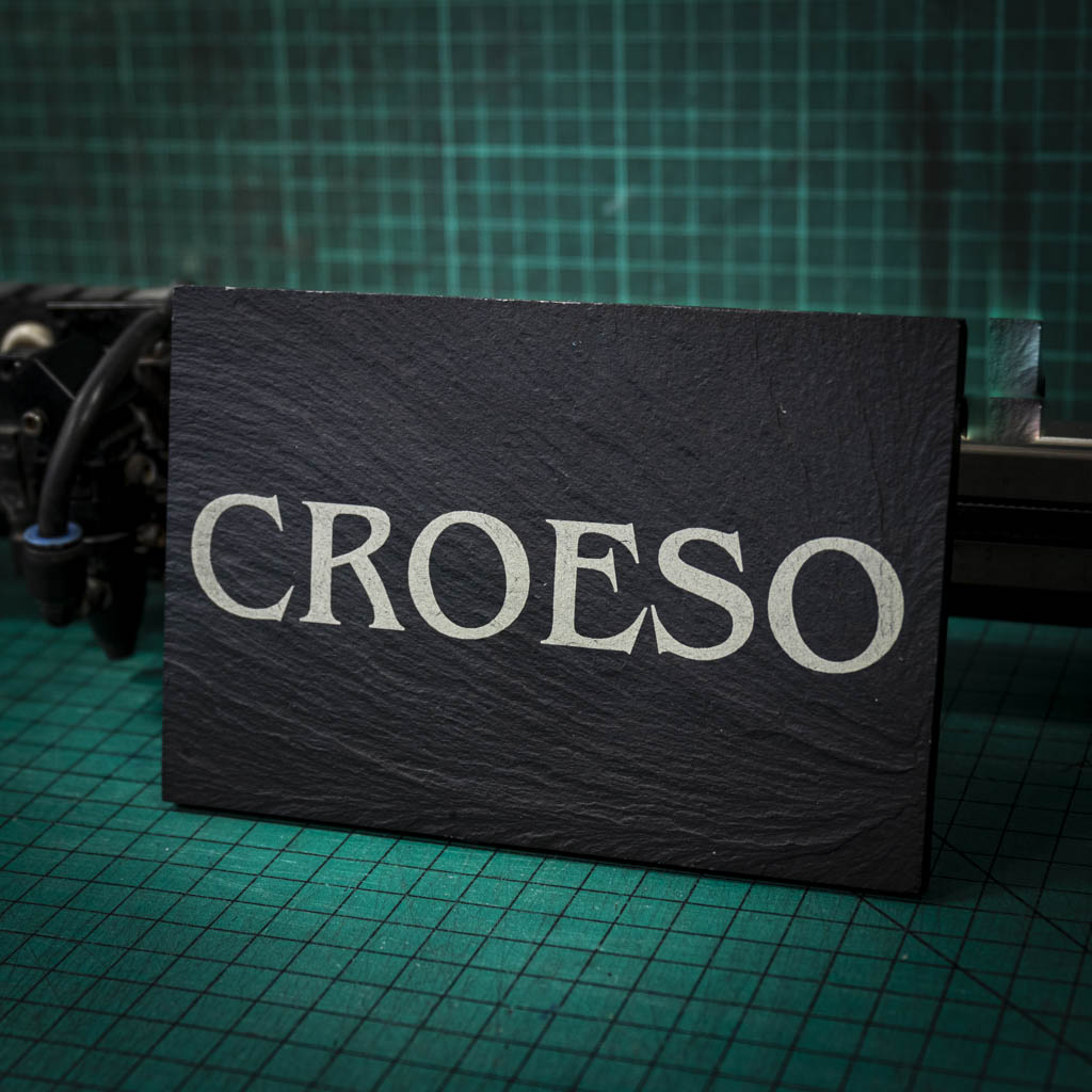 A welsh slate stand up plaque laser engraved with the welsh word for welcome, croeso