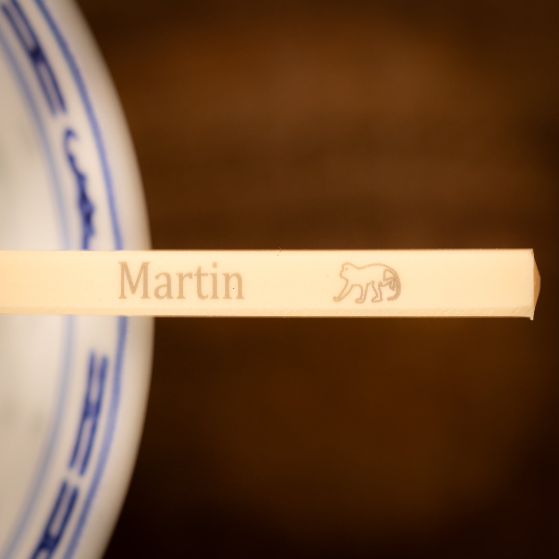 Cream coloured plastic melamine personalised chopsticks engraved with a name and Chinese Zodiac Animal, The Year of the Monkey.