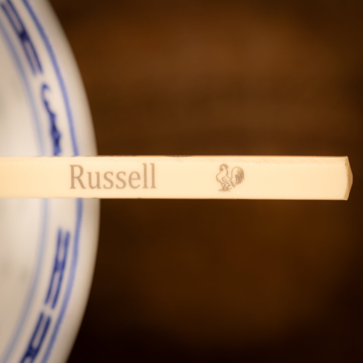 Cream coloured plastic melamine personalised chopsticks engraved with a name and Chinese Zodiac Animal, The Year of the Roaster.
