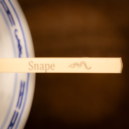 Cream coloured plastic melamine personalised chopsticks engraved with a name and Chinese Zodiac Animal, The Year of the Snake.