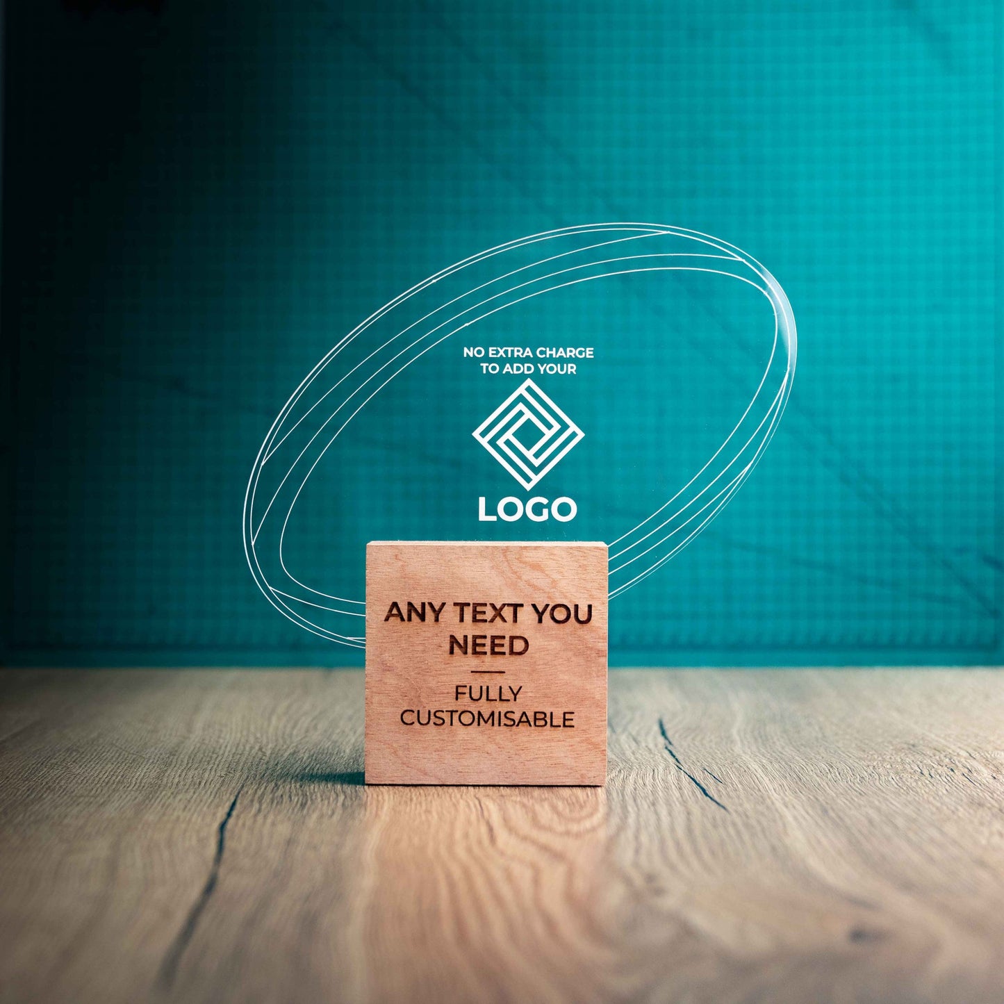 A large rugby trophy with custom text and logos, on an eco-friendly wooden base, with a clear Perspex rugby ball mounted on top, featuring fully customisable areas for text and logos.