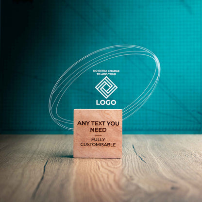 A large rugby trophy with custom text and logos, on an eco-friendly wooden base, with a clear Perspex rugby ball mounted on top, featuring fully customisable areas for text and logos.