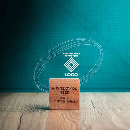 A medium rugby trophy with custom text and logos, on an eco-friendly wooden base, with a clear Perspex rugby ball mounted on top, featuring fully customisable areas for text and logos.