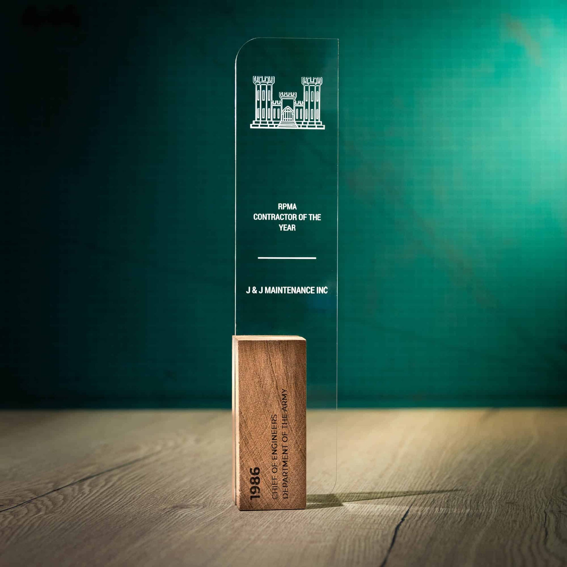 Sabre Trophy, an artistic personalised laser engraved perspex trophy with a wooden base