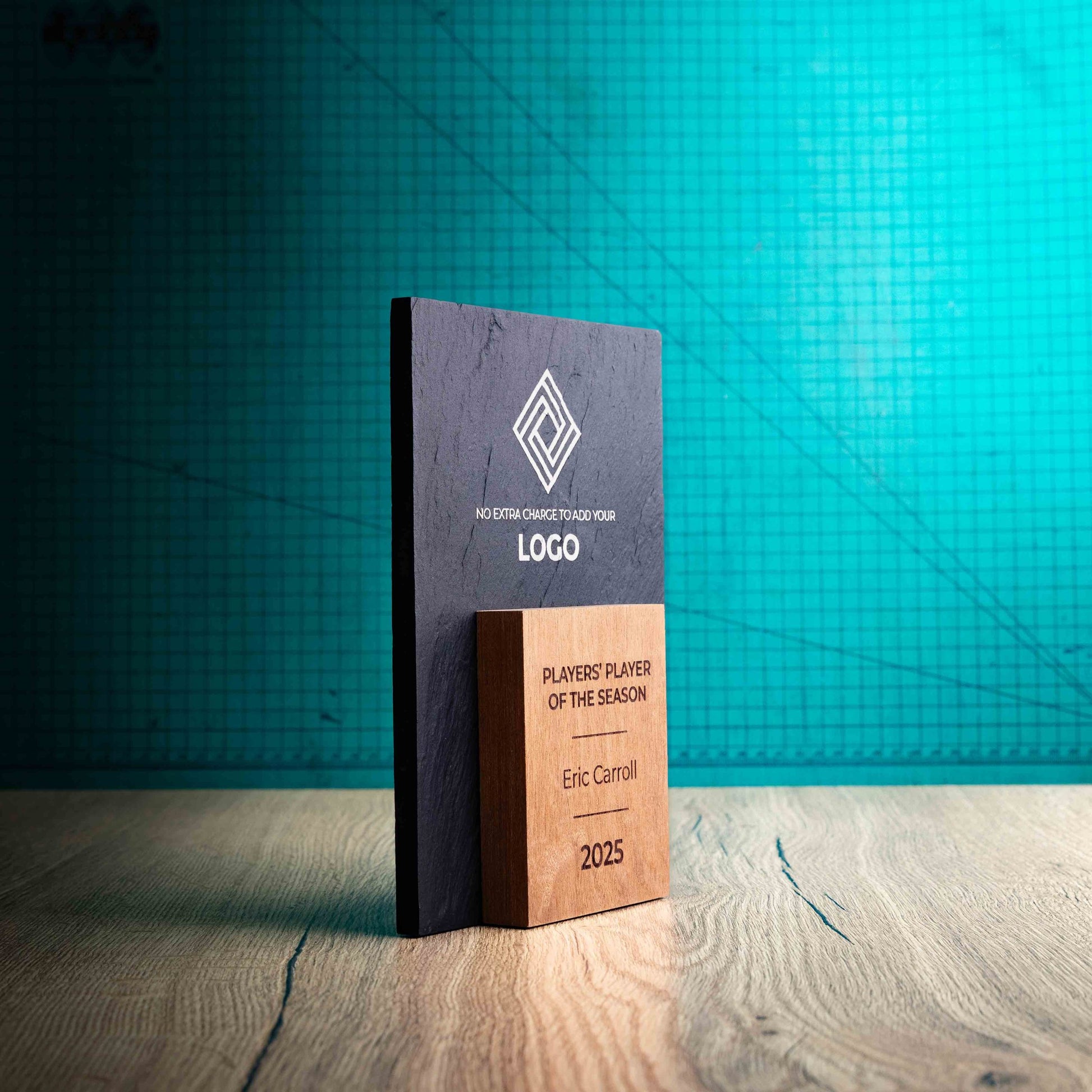 A side angle of a Medium Sarsen Award, a laser engraved, eco-friendly, wooden and slate trophy