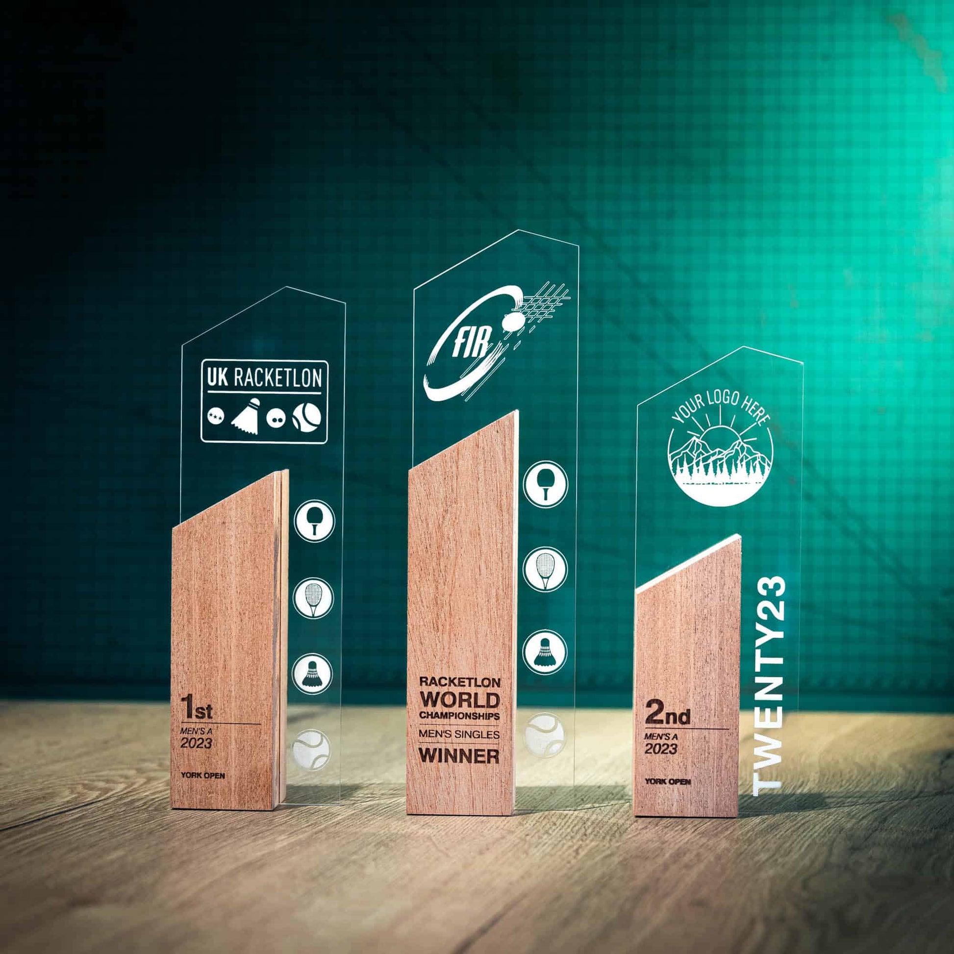 Three Sky Trophies, an artistic personalised laser engraved perspex trophy with an eco-friendly wooden base