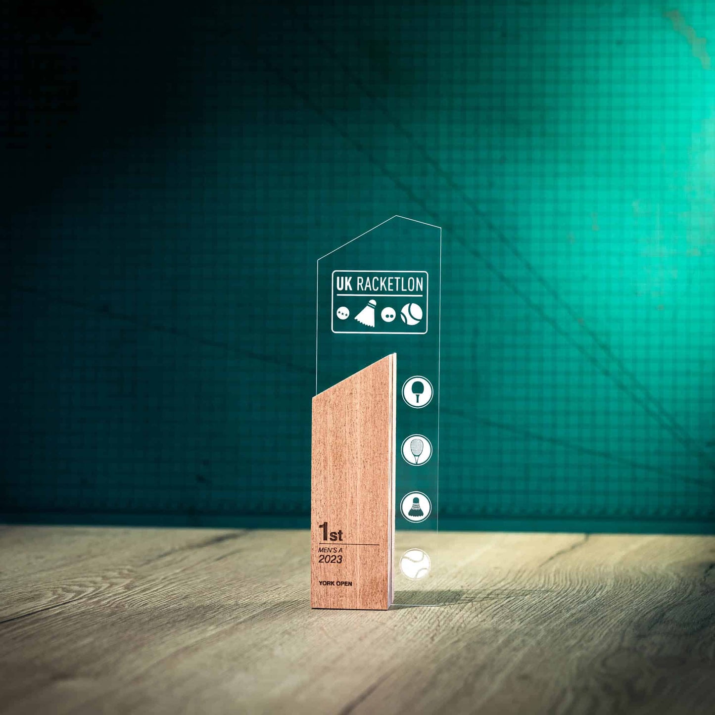 Medium Sky Trophy, an artistic personalised laser-engraved perspex trophy with an eco-friendly wooden base