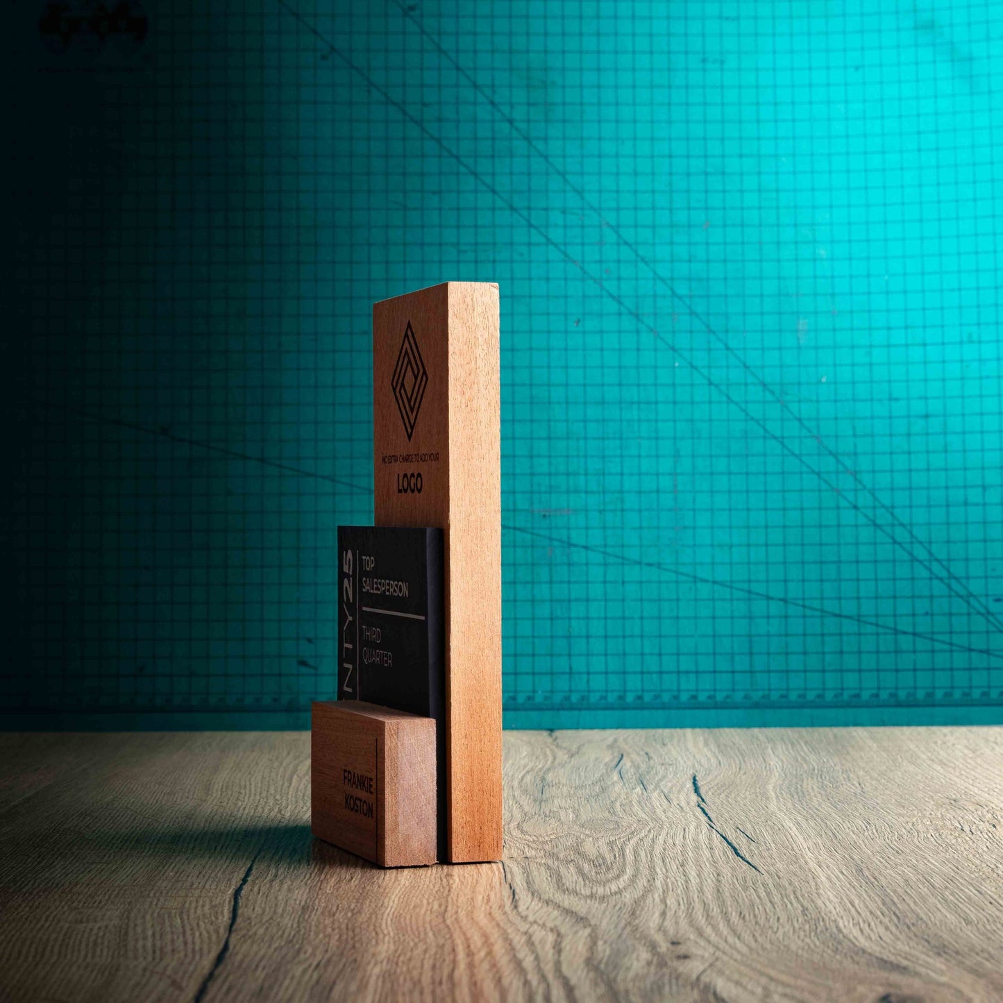 A side angle of a Medium Skyline Award, a laser engraved, eco-friendly, wooden and slate trophy