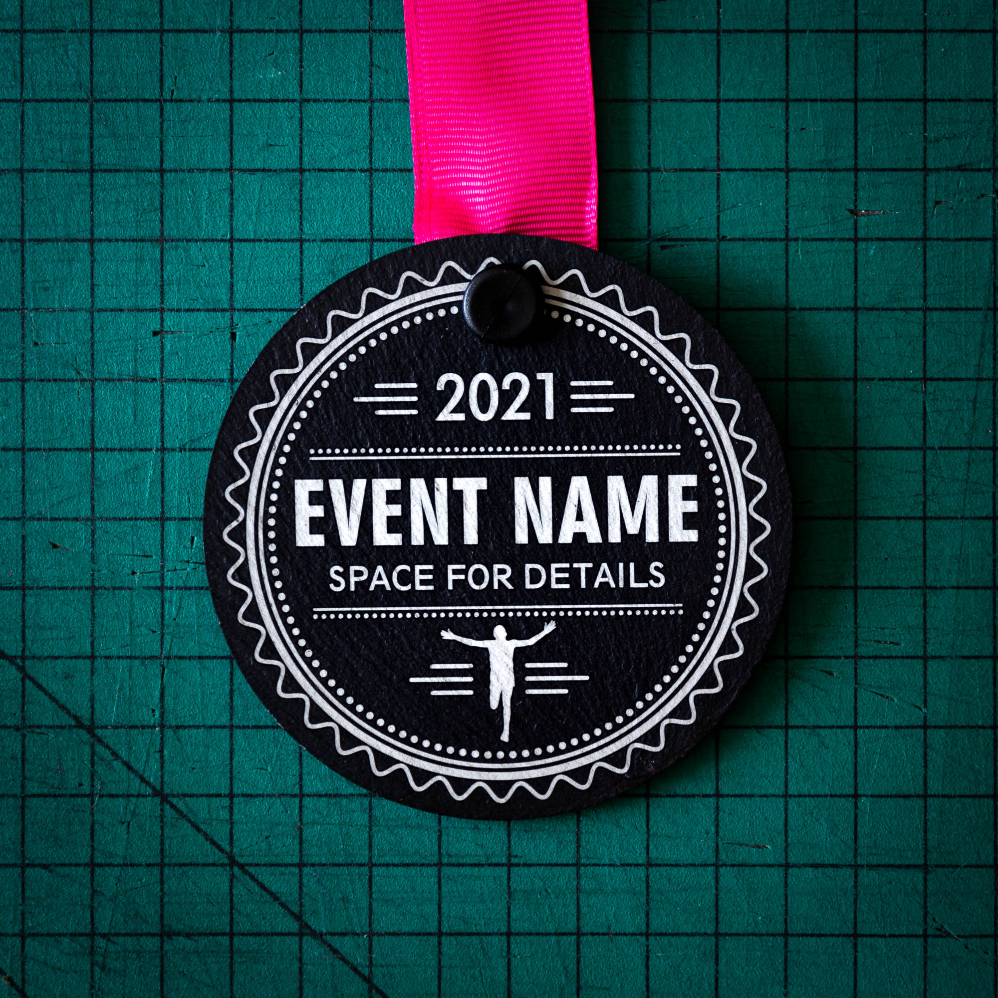 A personalised laser engraved Welsh slate sports medal
