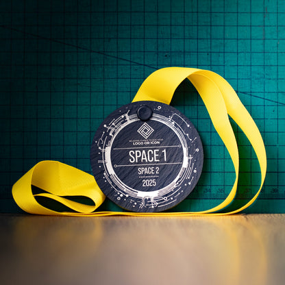 A personalised laser engraved Welsh slate sports medal