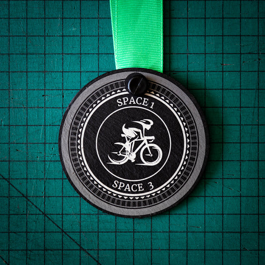 A personalised laser engraved Welsh slate sports medal