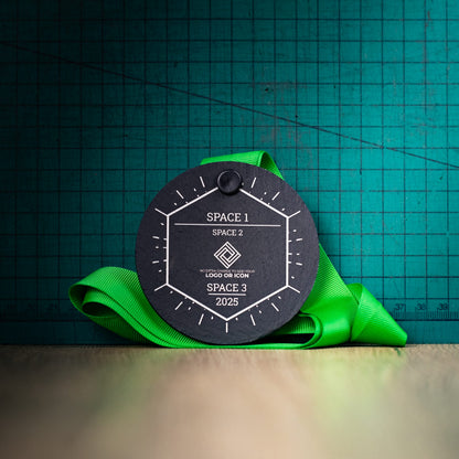 A personalised laser engraved Welsh slate sports medal