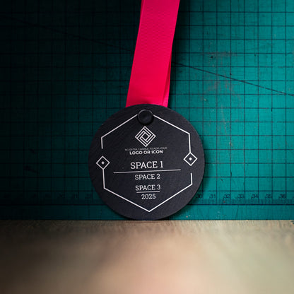A personalised laser engraved Welsh slate sports medal