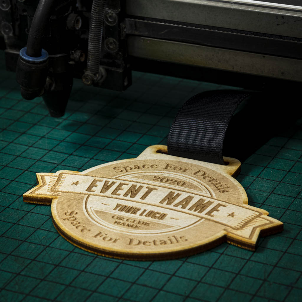 A laser engraved personalised Eco-friendly wooden medal
