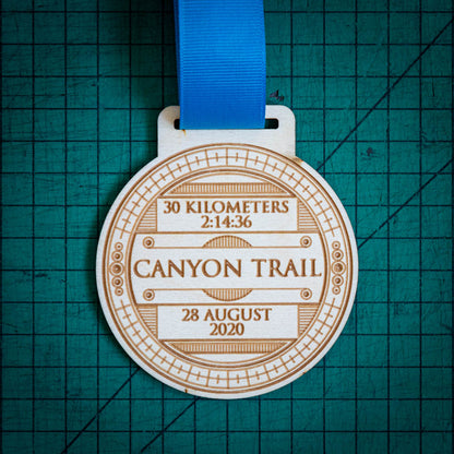 A laser engraved personalised Eco-friendly wooden medal