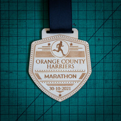 A laser engraved personalised Eco-friendly wooden medal