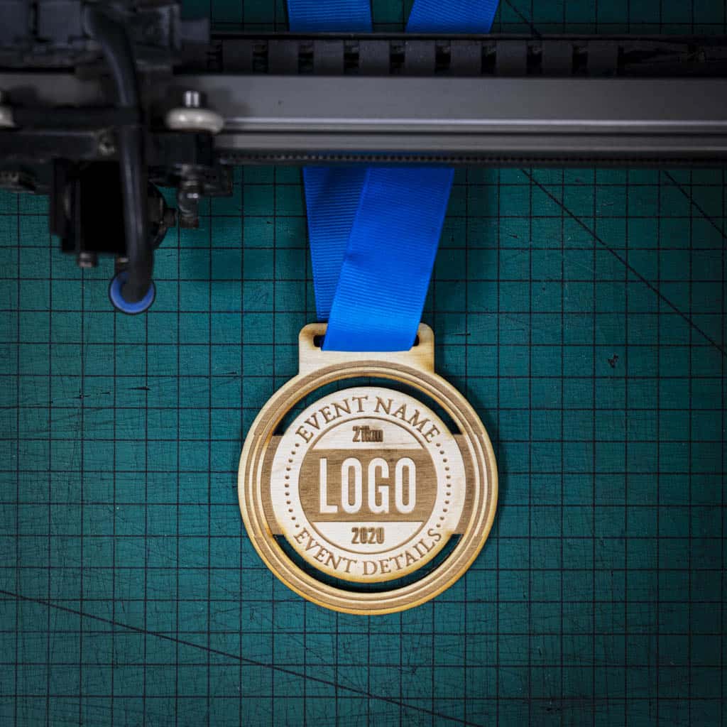 A laser engraved personalised Eco-friendly wooden medal