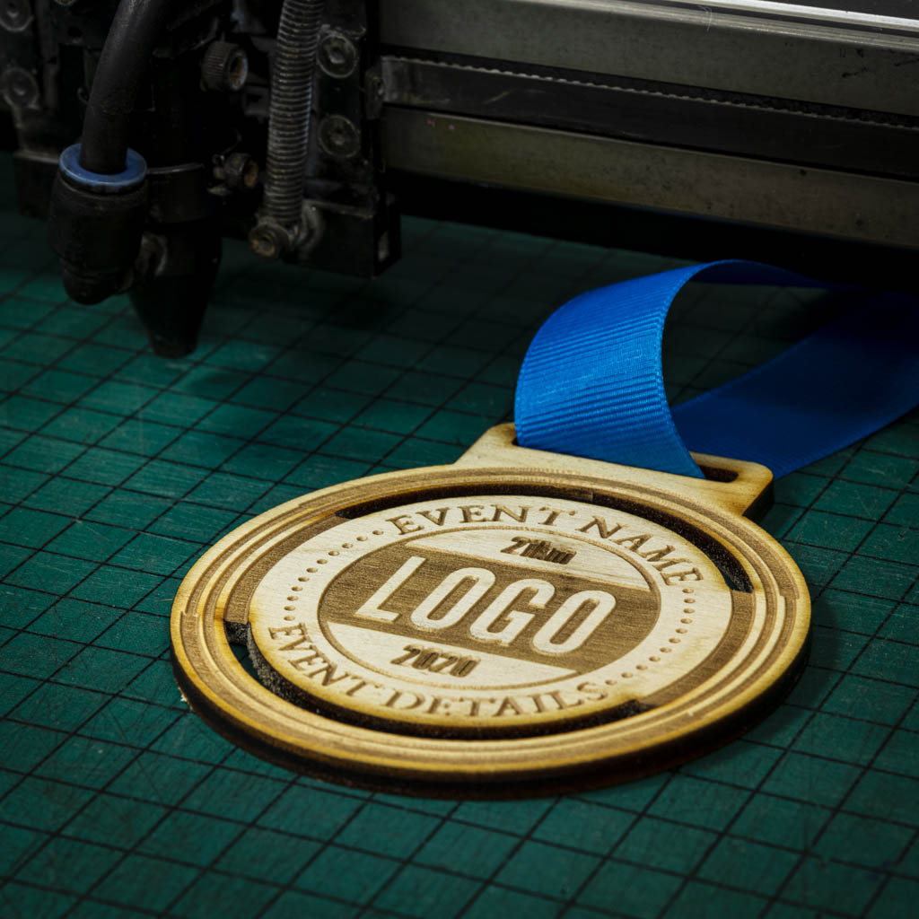 A laser engraved personalised Eco-friendly wooden medal