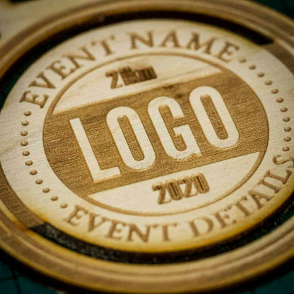 A laser engraved personalised Eco-friendly wooden medal