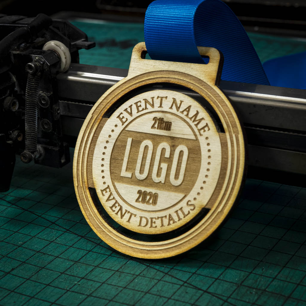 A laser engraved personalised Eco-friendly wooden medal