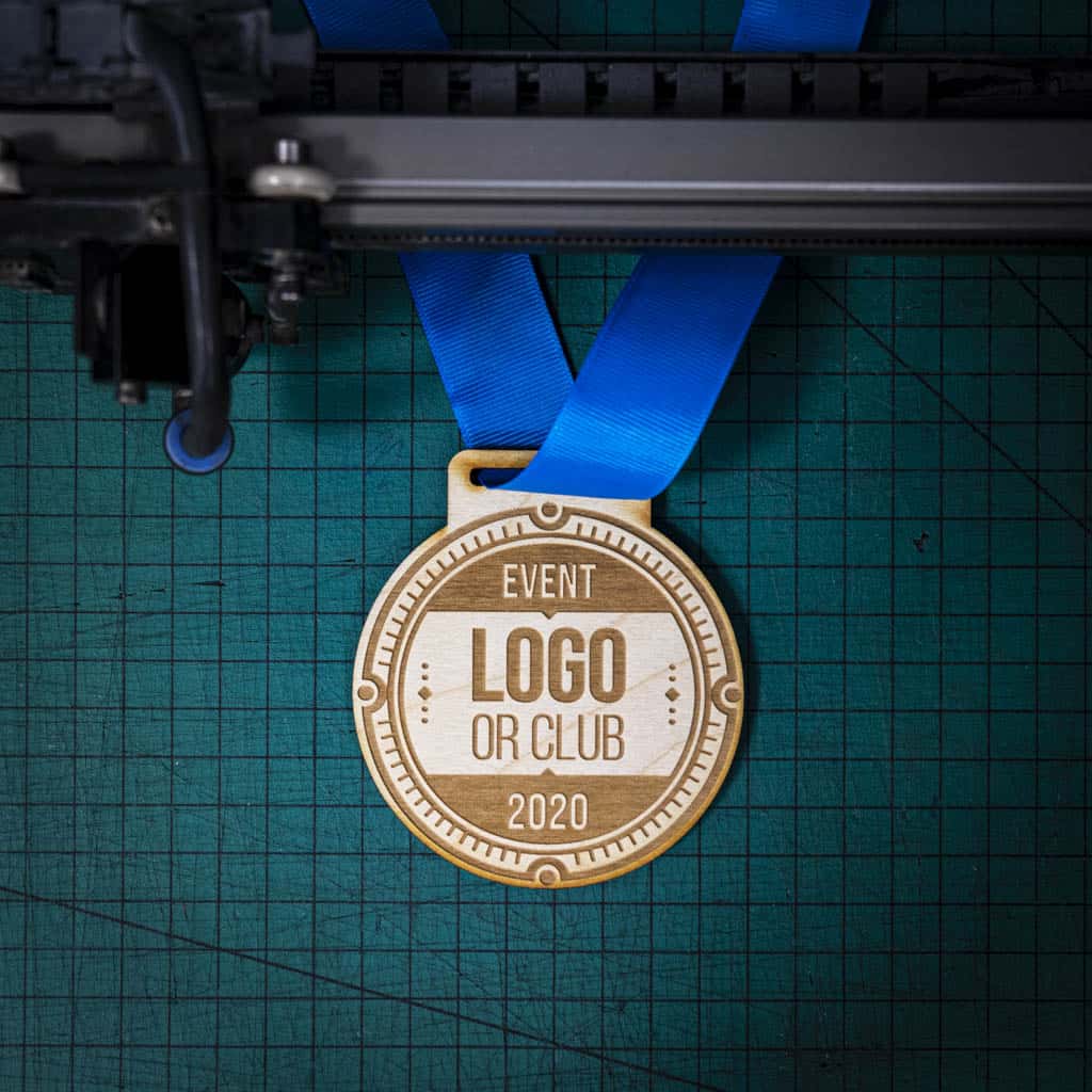 A laser engraved personalised Eco-friendly wooden medal