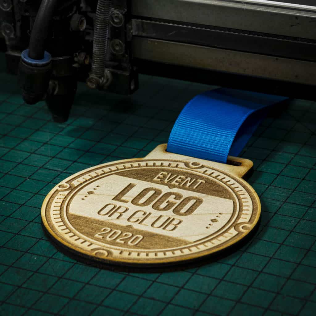 A laser engraved personalised Eco-friendly wooden medal