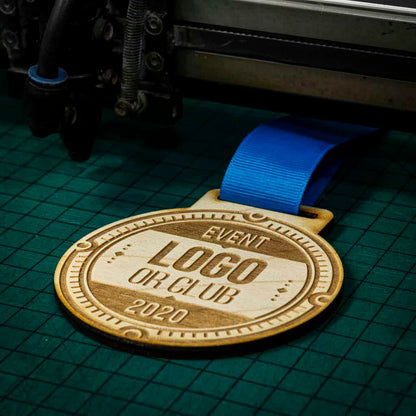 A laser engraved personalised Eco-friendly wooden medal