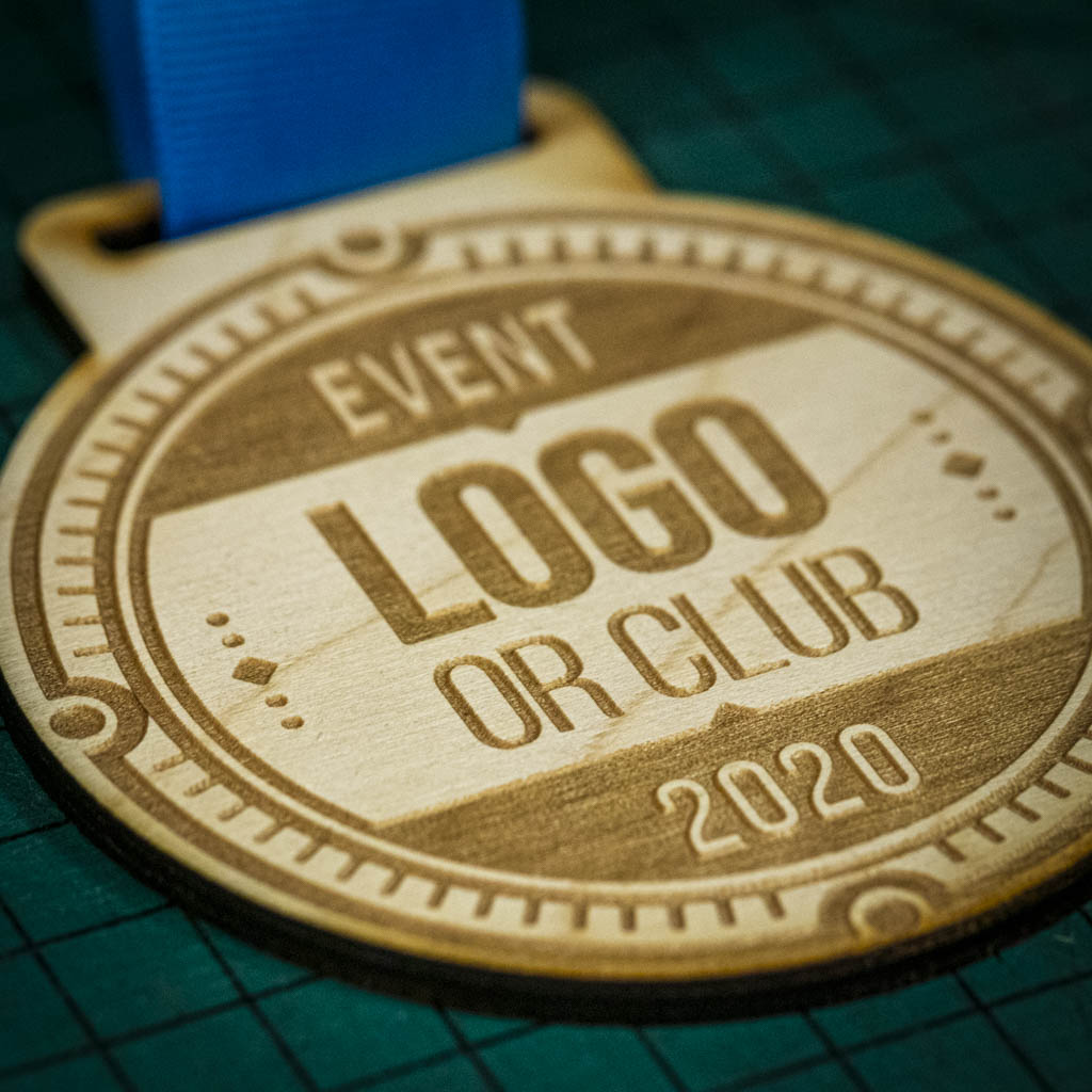 A laser engraved personalised Eco-friendly wooden medal