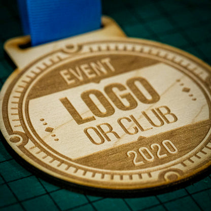 A laser engraved personalised Eco-friendly wooden medal