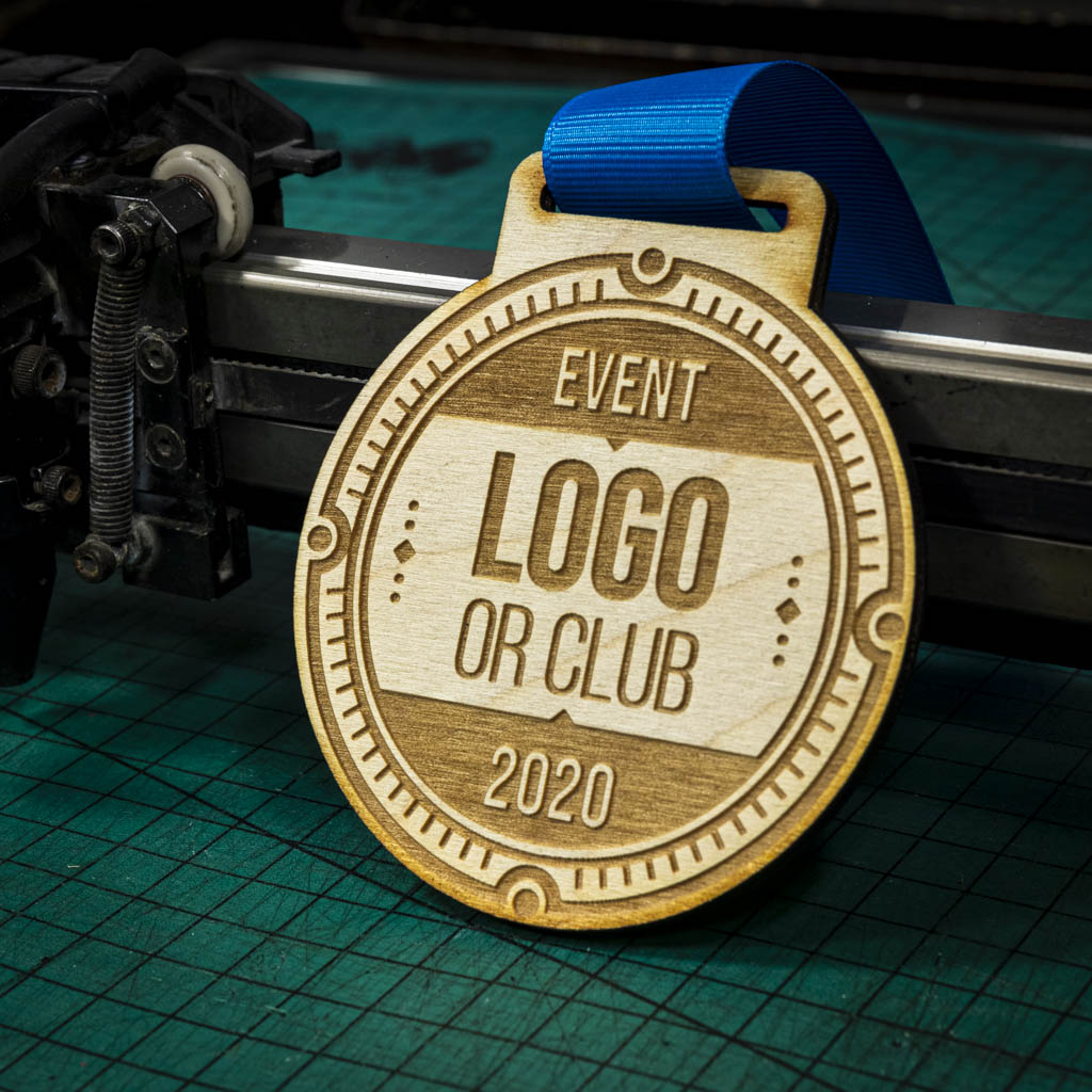 A laser engraved personalised Eco-friendly wooden medal