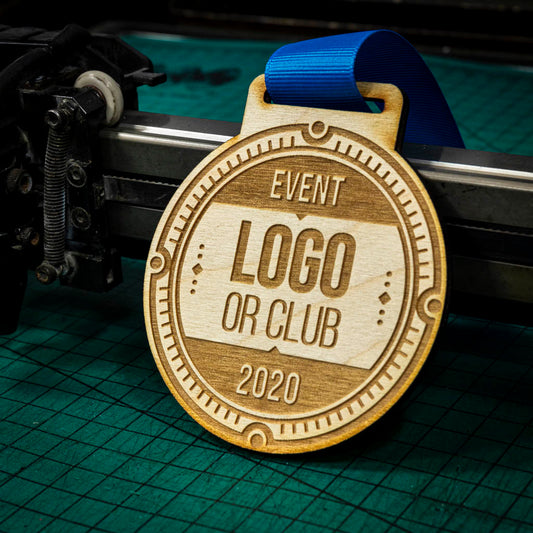 A laser engraved personalised Eco-friendly wooden medal